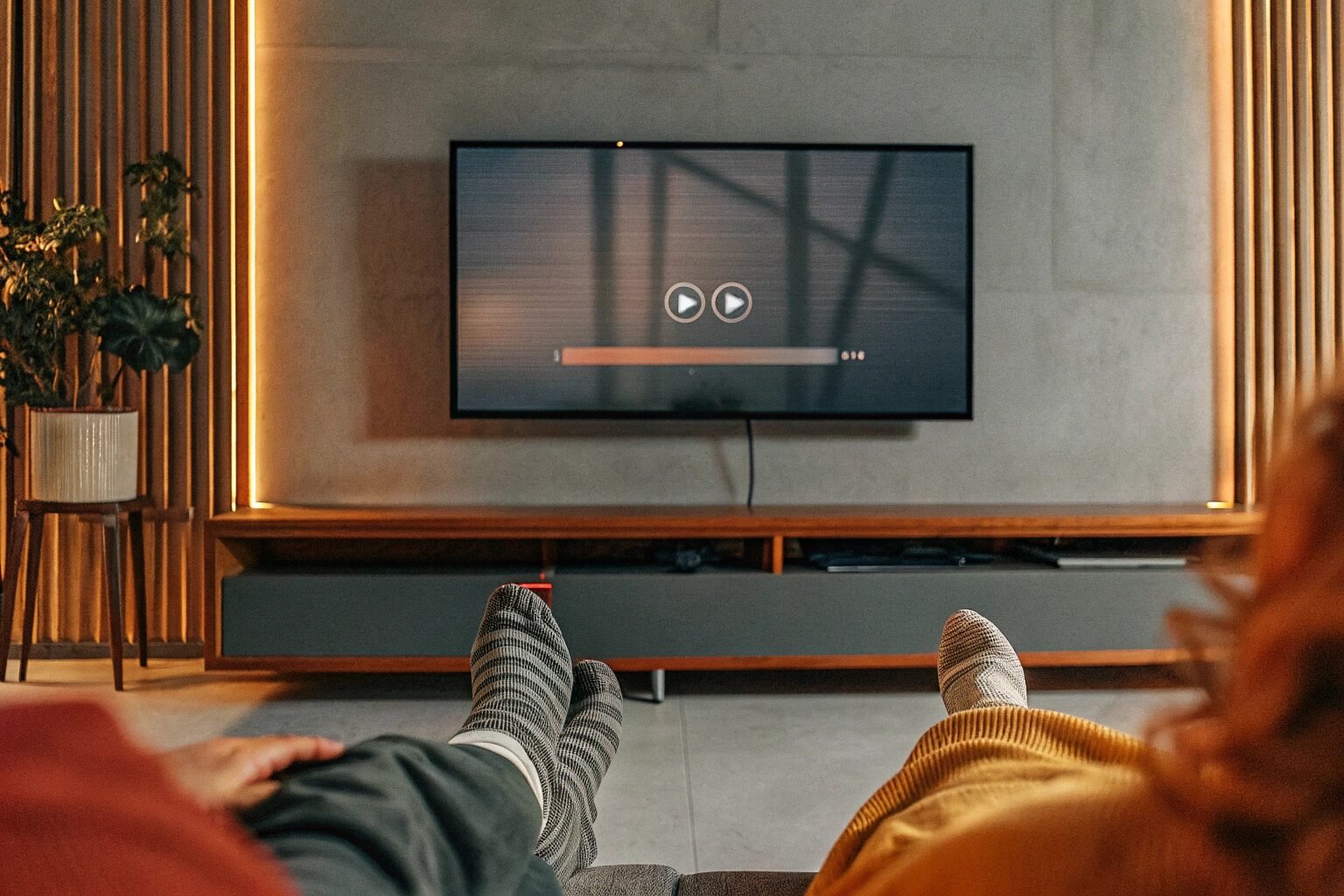Person frustrated with frozen TV stream